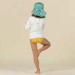 Chapeau Anti UV Bébé Réversible Jaune Et Bleu Imprimé SAVANE -Sportmania chapeau anti uv bebe reversible bleu et imprime palmiers 5