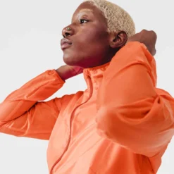 Kalenji Veste Running Coupe Vent Femme - Wind Corail -Sportmania veste coupe vent running run wind rose corail fluo femme 2